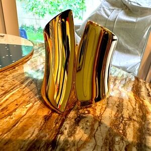 Wide cuff bracelet. Beautifully textured golden.